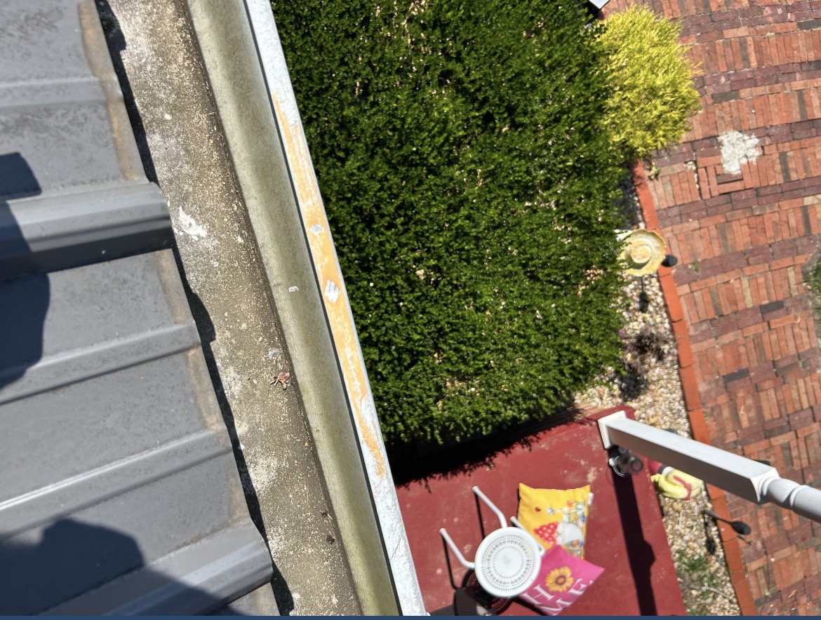 Gutter damage from 2 inch hail